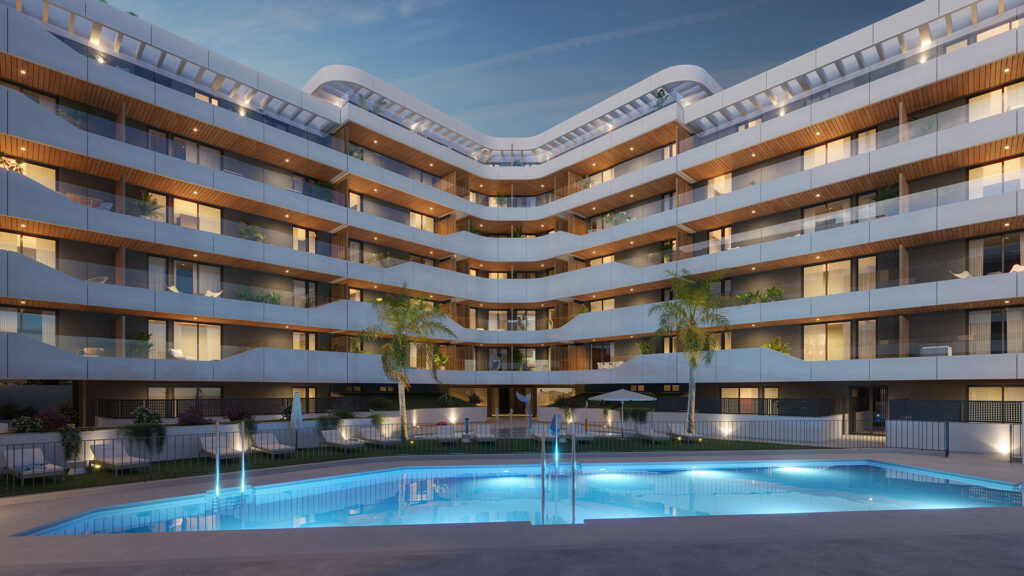 vista-nocturna-zonas-comunes-con-piscina-alma-estepona-3-level